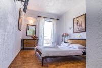 Postel nebo postele na pokoji v ubytování Creta Aquamarine Hotel