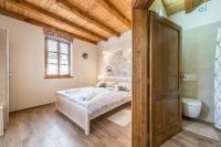 Postel nebo postele na pokoji v ubytování Villa Dumina