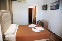 Postel nebo postele na pokoji v ubytování Zeus Hotel