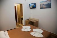 Postel nebo postele na pokoji v ubytování Zeus Hotel