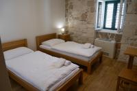 Posteľ alebo postele v izbe v ubytovaní Guest house Jere Old Town