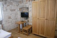 Televízia a/alebo spoločenská miestnosť v ubytovaní Guest house Jere Old Town