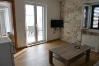 Televízia a/alebo spoločenská miestnosť v ubytovaní Guest house Jere Old Town
