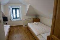 Posteľ alebo postele v izbe v ubytovaní Guest house Jere Old Town