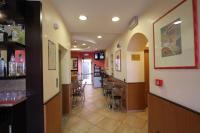 A restaurant or other place to eat at Hotel Della Volta