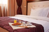 A bed or beds in a room at Best Western Plus Bristol Hotel