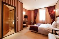 A bed or beds in a room at Best Western Plus Bristol Hotel