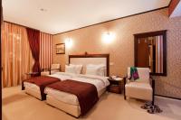 A bed or beds in a room at Best Western Plus Bristol Hotel