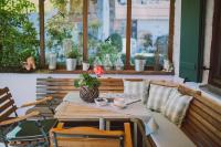 Posezení v ubytování Dreimäderlhaus - Das vegetarische Boutique Hotel