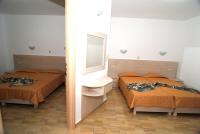 Postel nebo postele na pokoji v ubytování Zeus Hotel