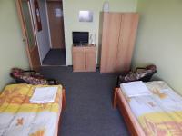 Postel nebo postele na pokoji v ubytování Penzion U Kašných