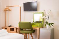 A television and/or entertainment centre at TheJoy City Suites