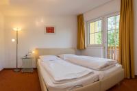 Łóżko lub łóżka w pokoju w obiekcie Haus Elisengrund am Geigenbuehel - chalet privé