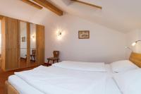 Łóżko lub łóżka w pokoju w obiekcie Haus Elisengrund am Geigenbuehel - chalet privé