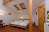 Łóżko lub łóżka w pokoju w obiekcie Haus Elisengrund am Geigenbuehel - chalet privé