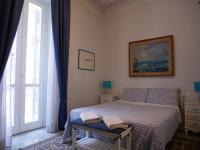 A bed or beds in a room at Nori Guest House