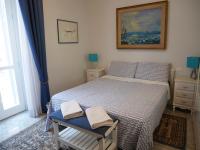A bed or beds in a room at Nori Guest House