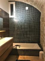 Salle de bains dans l&#39;&eacute;tablissement Loft Christina moderne et confortable, vue lac, climatisation, parking