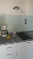 Kuchyňa alebo kuchynka v ubytovaní Apartments Lorio