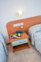 Postel nebo postele na pokoji v ubytování Hotel Darsena