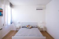 Mondello Beach - Rooms By The Seaにあるベッド