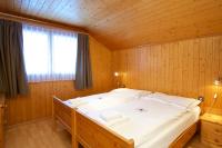 Postel nebo postele na pokoji v ubytování Chalet Felderhof