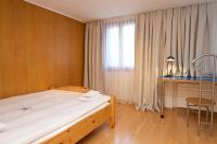 Postel nebo postele na pokoji v ubytování Chalet Felderhof