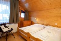 Postel nebo postele na pokoji v ubytování Chalet Felderhof