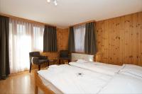 Postel nebo postele na pokoji v ubytování Chalet Felderhof