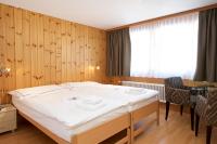 Postel nebo postele na pokoji v ubytování Chalet Felderhof