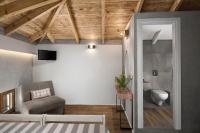 Postel nebo postele na pokoji v ubytování Morfeas Hotel