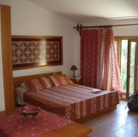 A bed or beds in a room at Vamos Palace Apartments