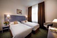 Postel nebo postele na pokoji v ubytování Central Hotel Prague