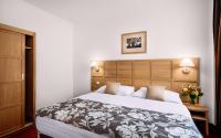 Postel nebo postele na pokoji v ubytování Central Hotel Prague