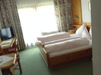 Posteľ alebo postele v izbe v ubytovaní Hotel Garni Almhof