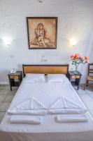 Postel nebo postele na pokoji v ubytování Creta Aquamarine Hotel