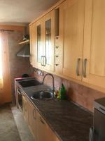 Kuchyňa alebo kuchynka v ubytovaní Andrea Holiday Home