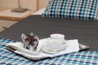Posteľ alebo postele v izbe v ubytovaní Hotel Perła