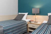 Posteľ alebo postele v izbe v ubytovaní Hotel Perła
