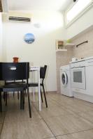 A kitchen or kitchenette at L'occhio sul Vesuvio appartamento con terrazza privata e casa vacanza senza terrazza privata