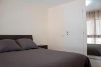 Postel nebo postele na pokoji v ubytování Galatex Beach Apartment