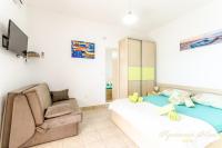 Posteľ alebo postele v izbe v ubytovaní Apartments Nives Suhi Potok