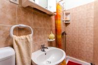 Kúpeľňa v ubytovaní Apartments Nives Suhi Potok