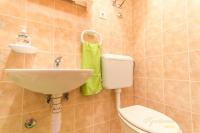 Kúpeľňa v ubytovaní Apartments Nives Suhi Potok