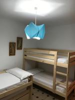 A bed or beds in a room at Roche Pinos Verdes