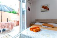 Posteľ alebo postele v izbe v ubytovaní Apartments Nives Suhi Potok