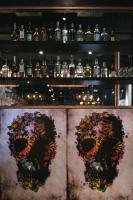 a bar with a display of bottles of alcohol at Original Sokos Hotel Vaakuna Rovaniemi in Rovaniemi