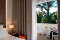Posteľ alebo postele v izbe v ubytovaní Hotel Marad
