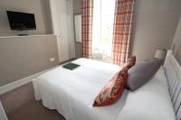 Postel nebo postele na pokoji v ubytování Sherwood Guest House