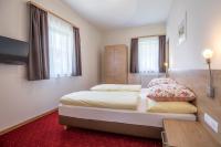 Posteľ alebo postele v izbe v ubytovaní Aparthotel Pichler